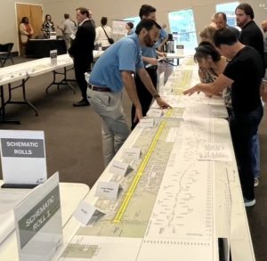 Attendees pore over schematics for the proposed widening of FM 663 in south Midlothian during a Texas Department of Transportation public meeting last Thursday at Midlothian Bible Church. (Natalya Shelton / Mirror contributor)